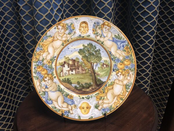 Piatto con paesaggio e puttino - Ceramiche di Castelli - immagine 3